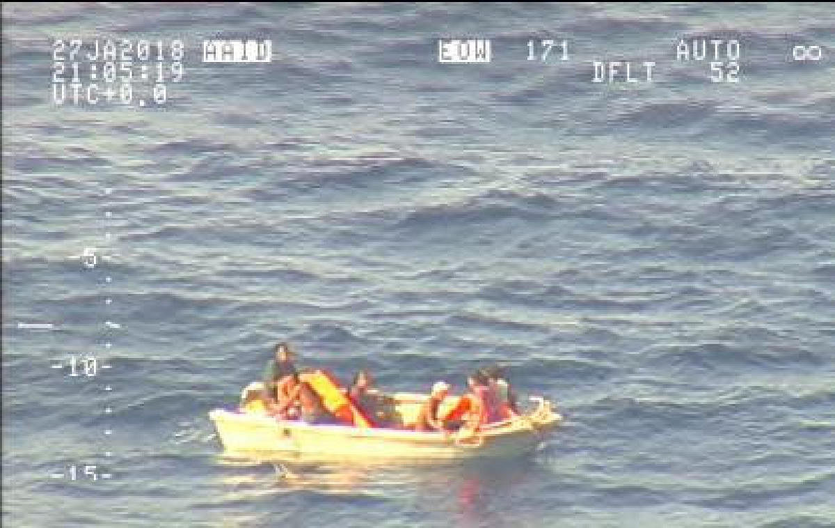 A handout photo supplied by the New Zealand Defence Force shows survivors from a ferry that sunk floating in a boat in the sea near the South Pacific nation of Kiribati. Reuters Photo