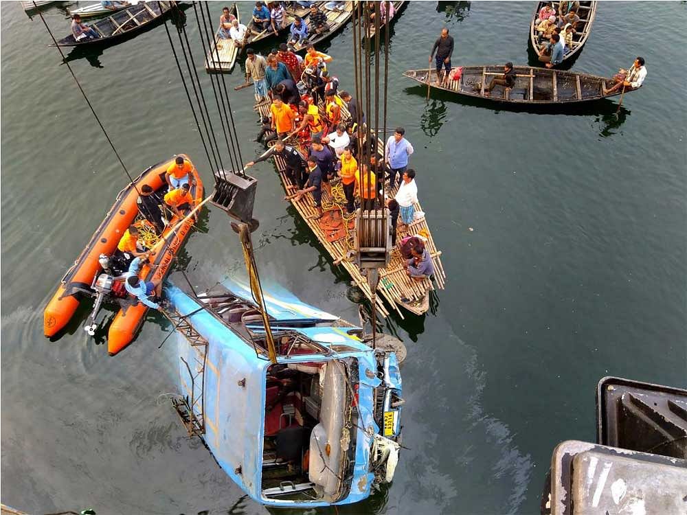 Bodies of 42 passengers were fished out and eight injured others were rescued from the Gogra canal at Balirghat area of the district. PTI Photo