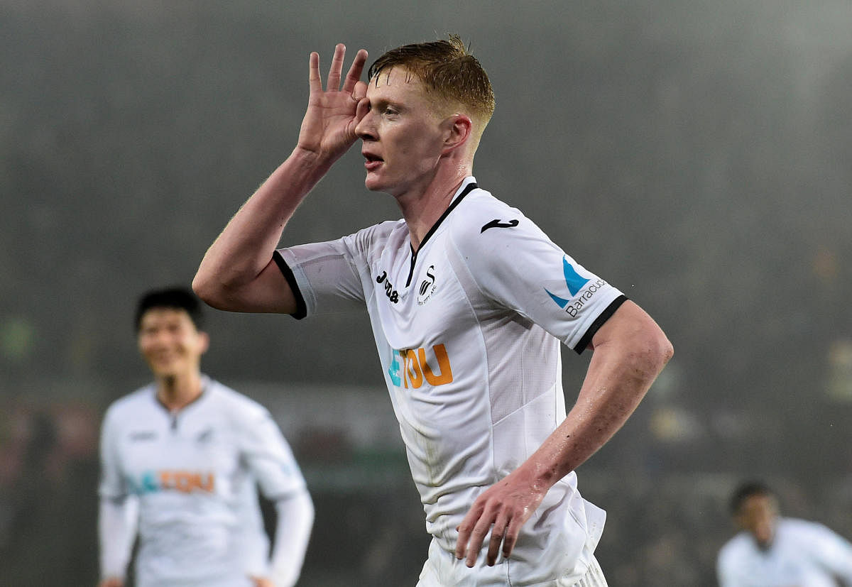 RESURGENCE CONTINUES Swansea City's Samuel Clucas celebrates after scoring the third goal during their win over Arsenal on Tuesday. REUTERS