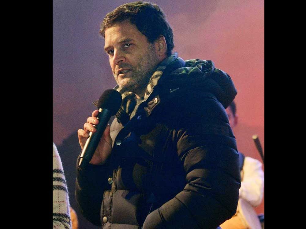 In an apparent retort to Rahul Gandhi's suit-boot ki sarkar jibe, the BJP had claimed the Congress President wore a jacket worth USD 995 at a concert organised by his party in the poll-bound state yesterday. PTI Photo