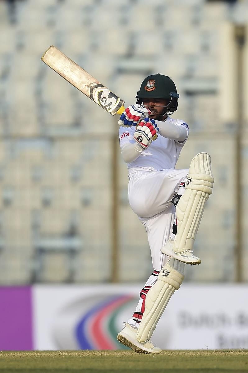 FETCH THAT! Bangladesh's Mominul Haque pulls one to the boundary during his century against Sri Lanka on Wednesday. AFP
