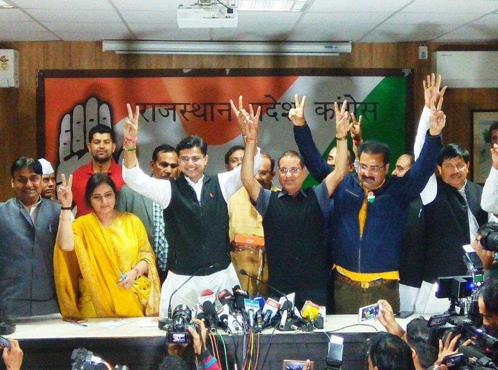 Congress functionaries celebrate after their victory in the Rajasthan bypolls. DH photo.