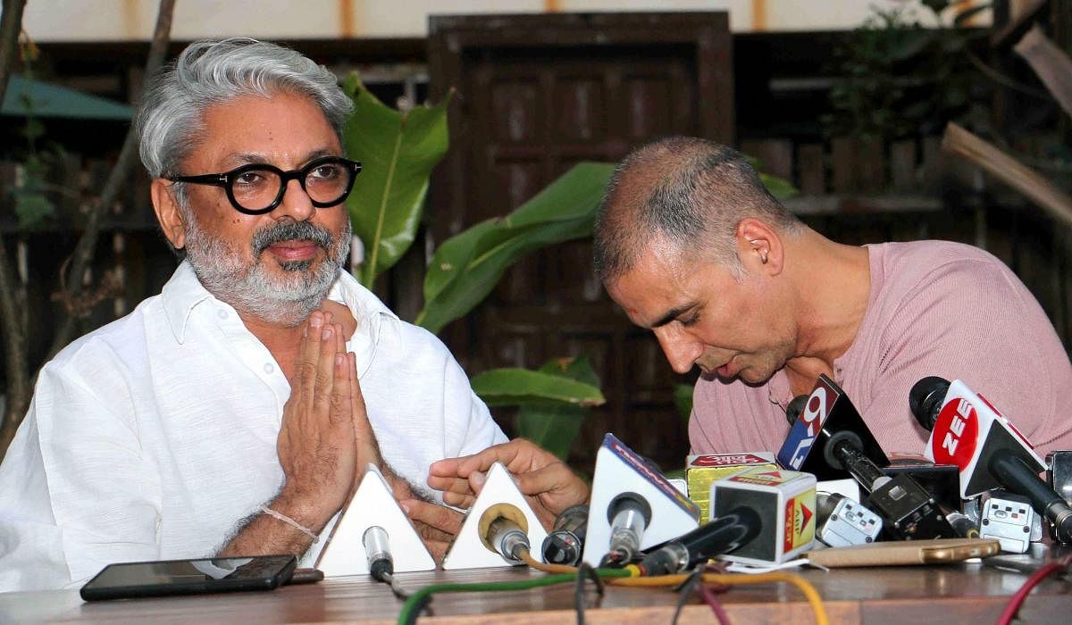 'PadMan' actor Akshay Kumar and 'Padmaavat' director Sanjay Leela Bhansali at a press conference in Mumbai on Friday. Bollywood star Akshay Kumar postponed the release date of his much-awaited film 'PadMan' to avoid a box office clash with Sanjay Leela Bhansali's controversial film 'Padmaavat'. PTI Photo