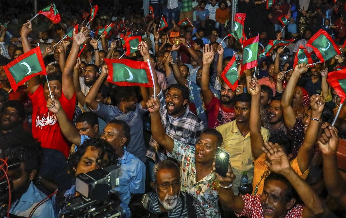 Maldivian opposition protestors shout slogans demanding the release of political prisoners during a protest in Male, Maldives, on Friday. AP/PTI