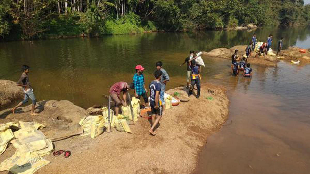 A mini check dam being built in Hosangadi village in Dakshina Kannada district.