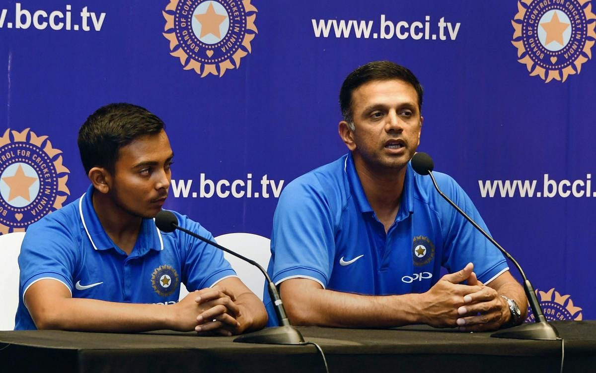 CALM INFLUENCE: Under-19 Cricket World Cup winning team coach Rahul Dravid and captain Prithvi Shaw during a press meet in Mumbai on Monday. PTI