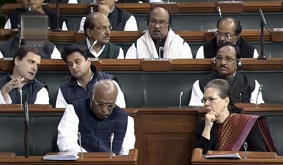 Sonia Gandhi, Rahul Gandhi, Mallikarjun Kharge and other Congress party members in the Lok Sabha in New Delhi. PTI