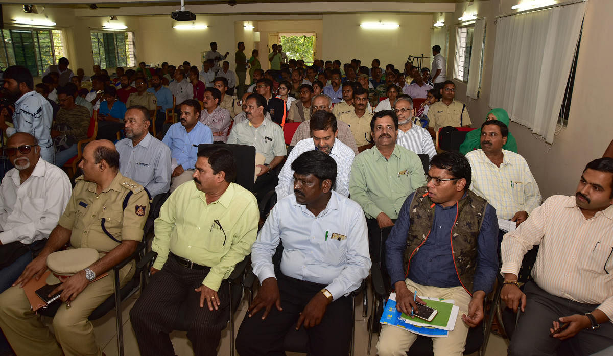 Chief Conservator of Forests, Mysuru Circle, P B Karunakar, Deputy Conservators of Forests Hanumanthappa and V Yedukondalu during a session on 'Leopard-Man Conflict, Control, Management', organised by the Forest department and Zoo Authority of Karnataka (ZAK), at Mysuru Zoo in Mysuru on Thursday.
