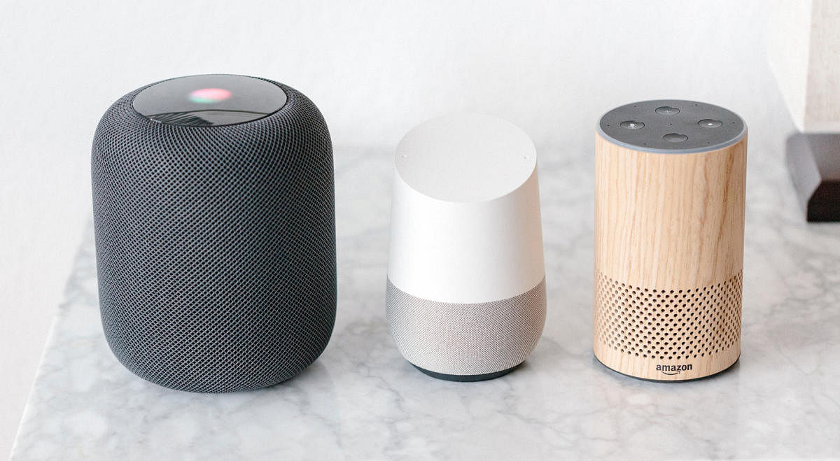 From left, the Apple HomePod, Google Home and Amazon's Alexa are displayed for a photograph in San Francisco on Feb. 5, 2018. The $349 HomePod costs roughly three times its competitors and arrives in stores on Feb. 9. (Jason Henry/The New York Times)