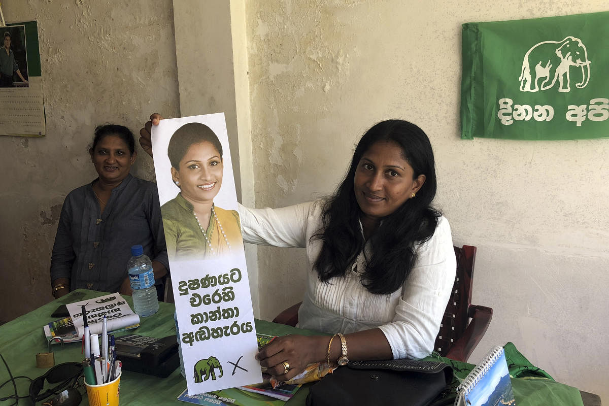 Harshani Sandaruwani, right, who is seeking a council seat in Kotte, Sri Lanka, and Madhu Hettiarachchi, left, who is helping her and other women as a political activist, Feb. 8, 2018. Sri Lanka has introduced a 25 percent quota for female candidates in local elections, but many have faced abuse, and obstructionism within their own parties.