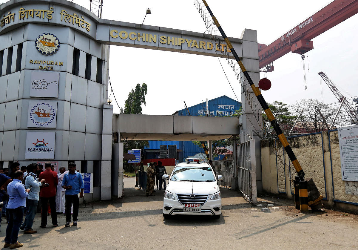 A police vehicle exits Cochin Shipyard Ltd in Kochi on Tuesday. REUTERS