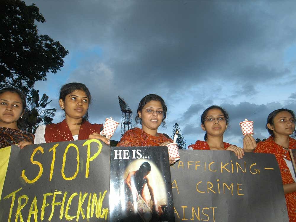 People protest against human trafficking. DH file photo.