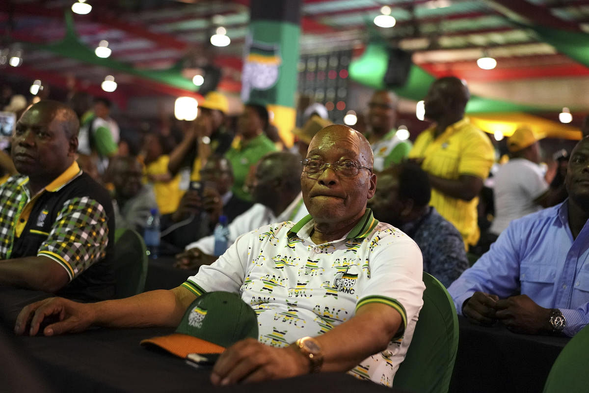 South African President Jacob Zuma looks on as an announcement is made that Deputy President Cyril Ramaphosa is the new leader of the African National Congress, in Johannesburg, Dec. 18, 2017. Top leaders of South Africa's governing party ordered Zuma to step down on Feb. 13, 2018, saying that his continued presence was eroding the 'renewed hope' felt since the election of new party leaders in December. NYT