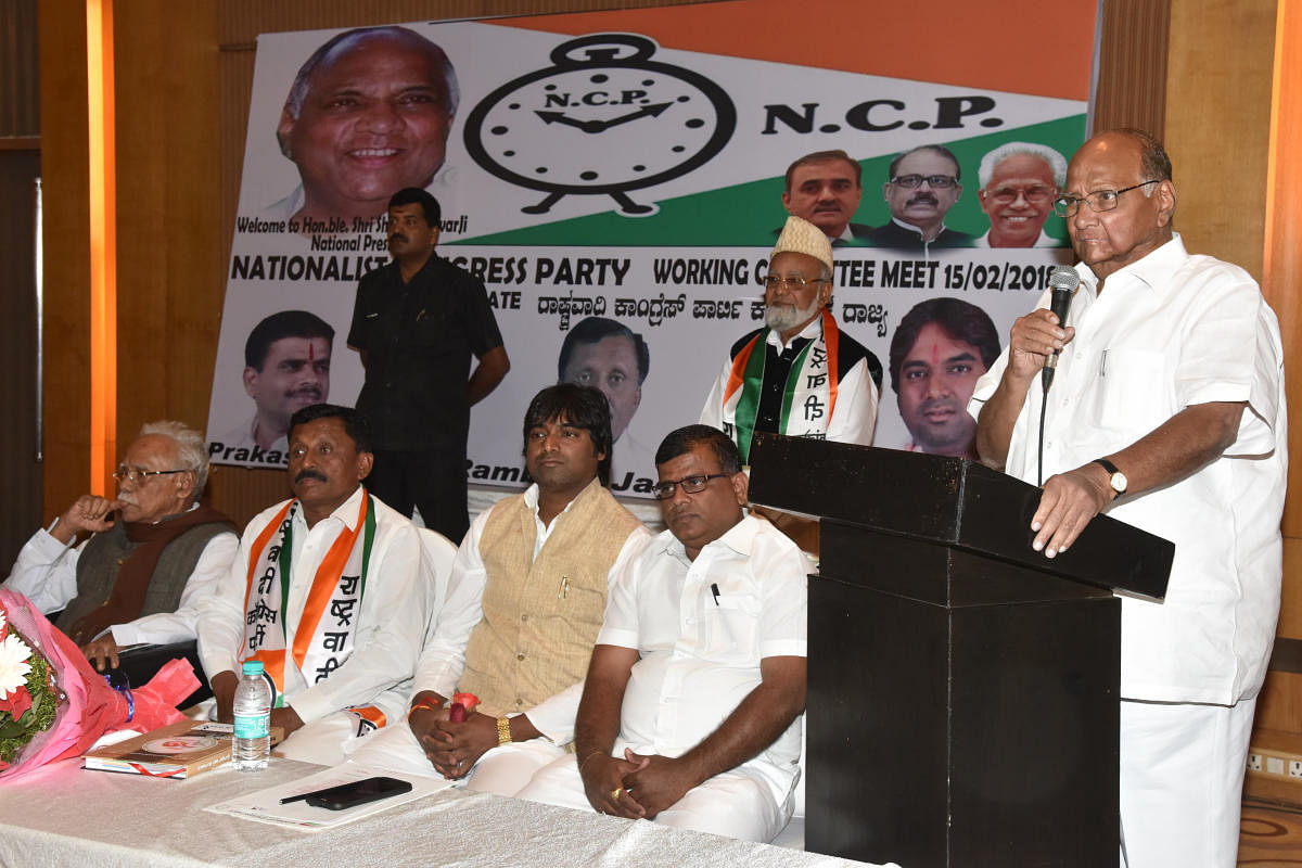Sharad Power, NCP National President speaking at District presidents meeting organised by State Nationalist Congress Party at Lalith Ashok hotel in Bengaluru on Thursday. T P Peethambaran, National General Secretary, NCP, Ram babu Jadav, Tilak Nambiar and Prakash K More, state NCP leaders are seen. Photo by S K Dinesh