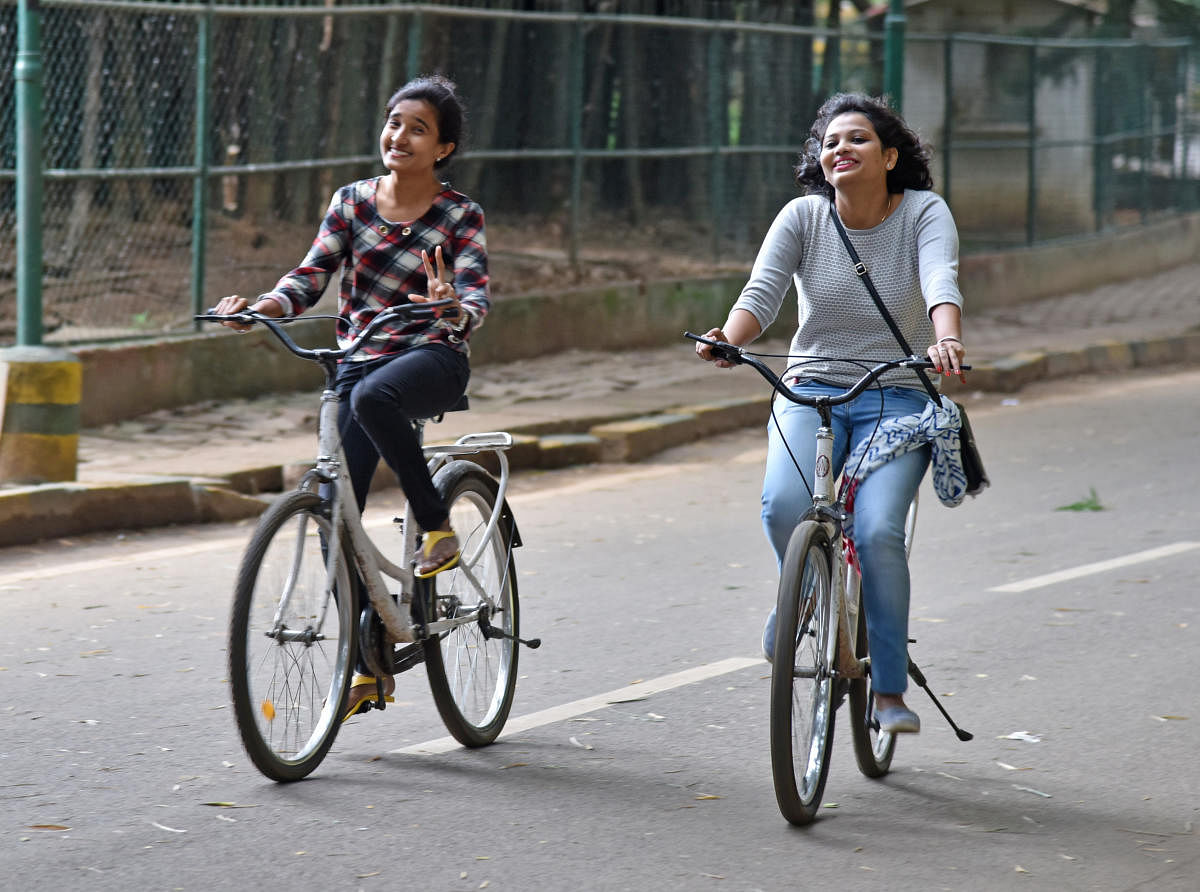 Cycling is loved by many in Bengaluru, but our dedicated lanes are taken up by parked cars. DH Photo by S K Dinesh