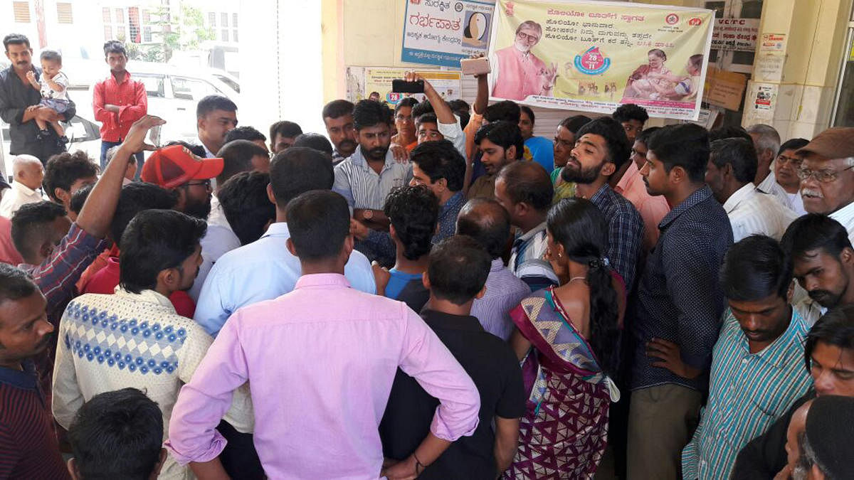 Alleging negligence by the doctors in treating a patient, a protest was staged in front of Virajpet government hospital on Friday.