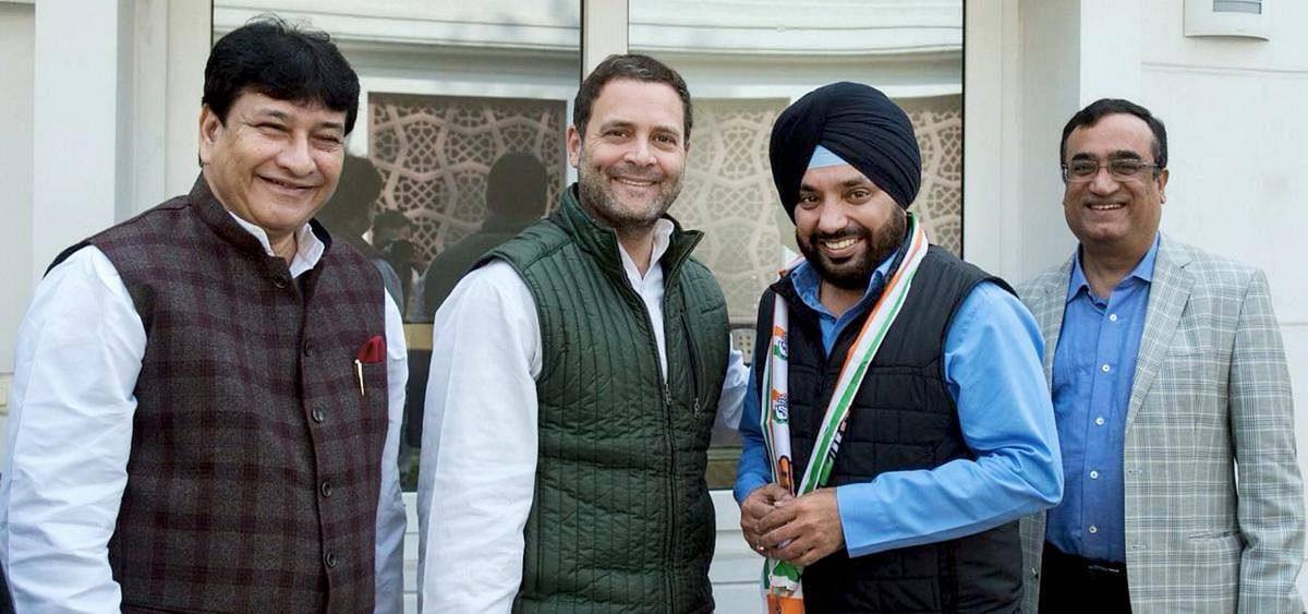 Congress President Rahul Gandhi welcomes Arvinder Singh Lovely back into the party as DPCC President Ajay Maken and party spokesperson Randeep Singh Surjewala look on, at AICC in New Delhi on Saturday. Lovely rejoined the party leaving BJP. PTI Photo