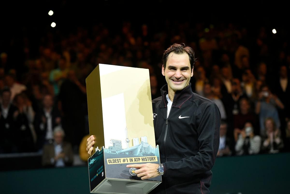 UNPRECEDENTED Swiss maestro Roger Federer holds the World No 1 plaque after confirming his rise to the top of the standings after beating Robin Haase in the Rotterdam quarterfinal on Friday. AFP