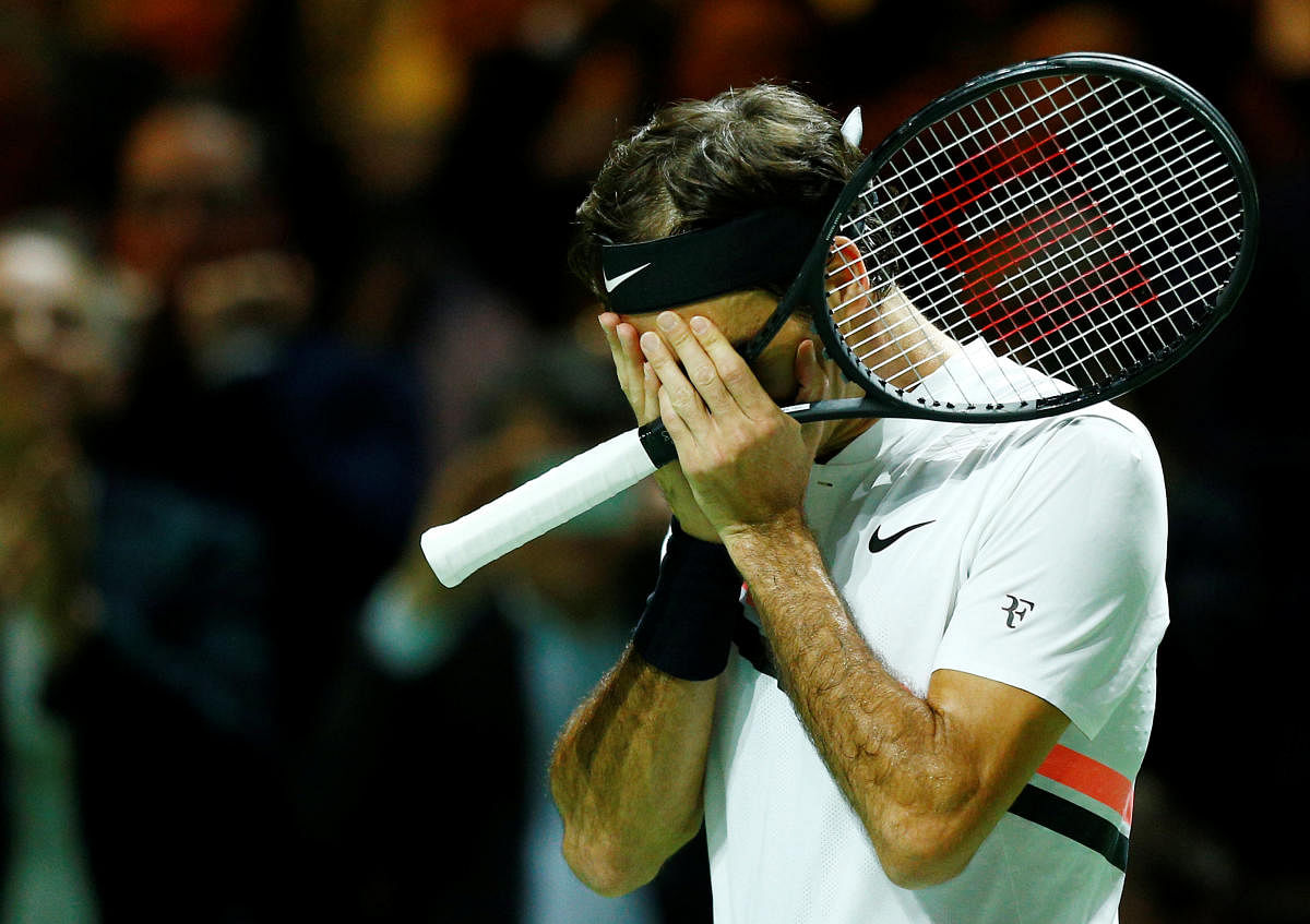 Roger Federer of Switzerland reacts after defeating Robin Haase of the Netherlands to reclaim the No 1 spot. REUTERS