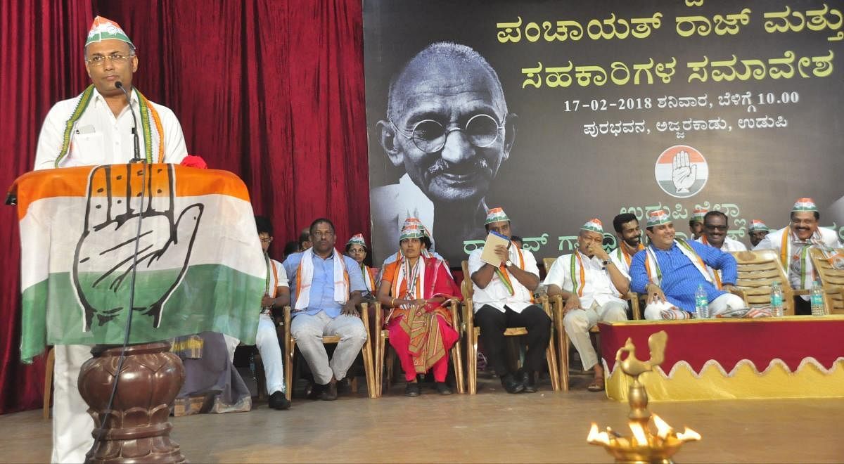 KPCC Working President Dinesh Gundu Rao speaks at a programme organised to mark silver jubilee of amendment to Panchayat Raj act, convention of panchayat raj and cooperatives, in Udupi on Saturday.