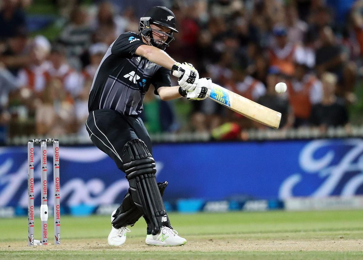 DESTRUCTIVE New Zealand's Colin Munro attempts to pull a delivery during his 57 against England in Hamilton on Saturday.