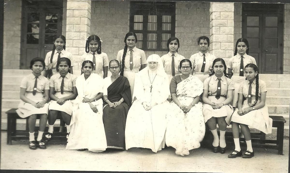 (Standing, from left) Radha Rajgopal, Ramani Bhat, Jayashree Patil, Tulsi Gulabrai, Mahalakshmi(Malu) and Revathi Rangachar. (Sitting, from left) Fidelina and Theresa (sisters), a teacher, Usha Pai, Reverend Mother Lawrance, Leela Pai, author and Shobha Kale.