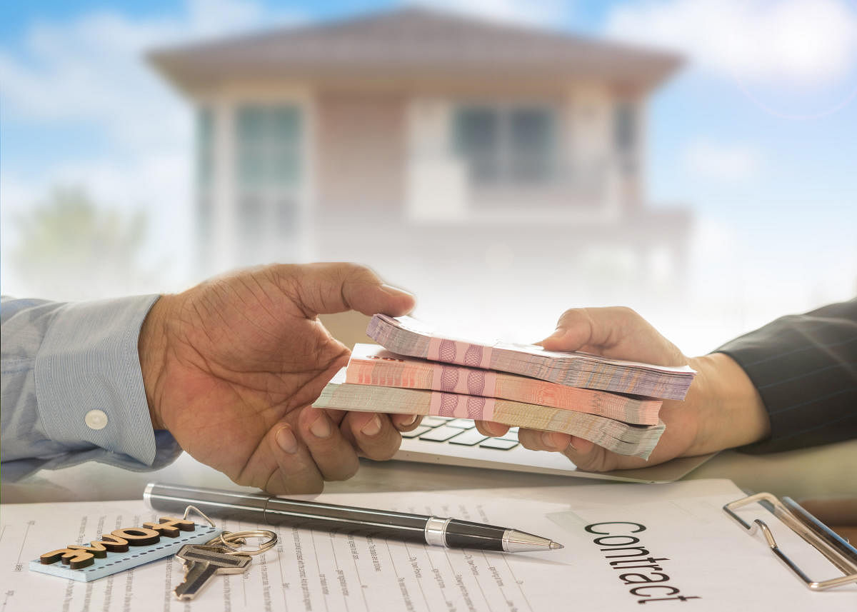 Mortgage loan real estate property concept. Banker give loan money to debtor.Loan