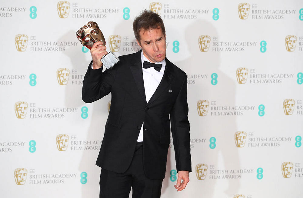 Sam Rockwell holds his award for Supporting Actor for Three Billboards Outside Ebbing Missouri at the British Academy of Film and Television Awards (BAFTA) at the Royal Albert Hall in London. Reuters photo.
