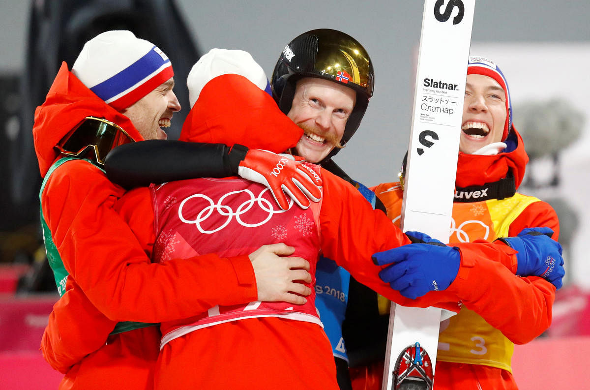 Ski Jumping - Pyeongchang 2018 Winter Olympics - Men's Team Final - Alpensia Ski Jumping Centre - Pyeongchang, South Korea - February 19, 2018 - Daniel Andre Tande, Andreas Stjernen, Johann Andre Forfang and Robert Johansson of Norway react to winning gold. REUTERS/Dominic Ebenbichler TPX IMAGES OF THE DAY