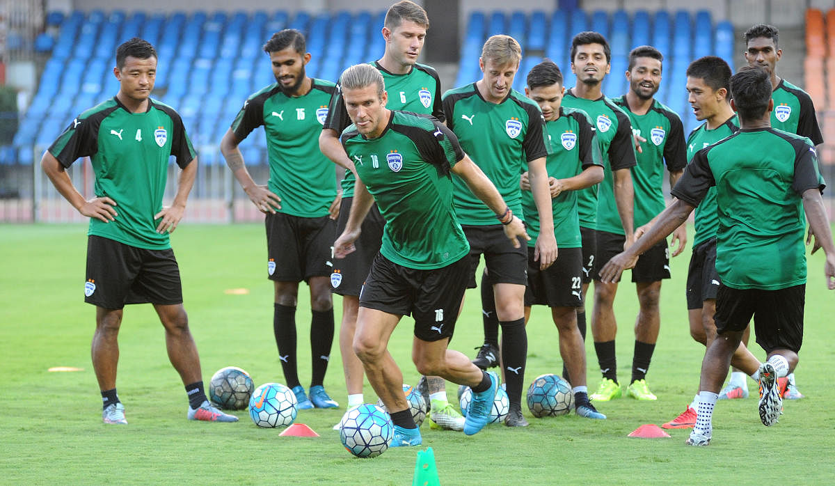 BFC players Eric Paartulu and his teammets during the practice session on the eve of their AFC match against maldives TC sports club at Sree Kanteerava stadium in Bengaluru on Monday. Photo Srikanta Sharma R.