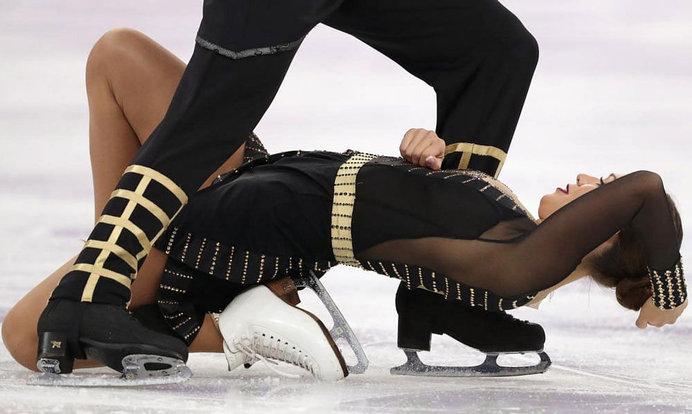 Figure Skating - Pyeongchang 2018 Winter Olympics - Ice Dance free dance competition final - Gangneung, South Korea - February 20, 2018 - Alisa Agafonova and Alper Ucar of Turkey perform. Reuters/Lucy Nicholson