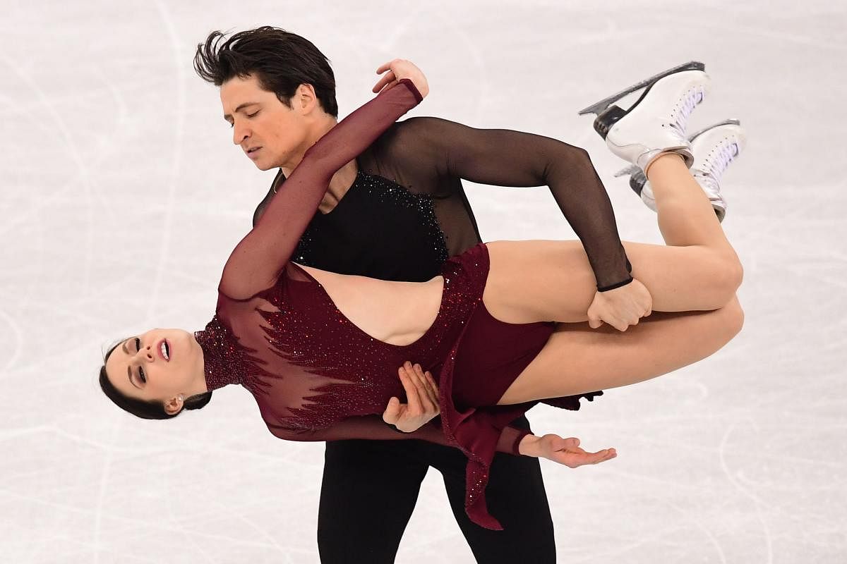 DAZZLING SHOW: Canada's Tessa Virtue and Scott Moir compete in the ice dance final at the Winter Olympics in Pyeongchang on Tuesday. AFP