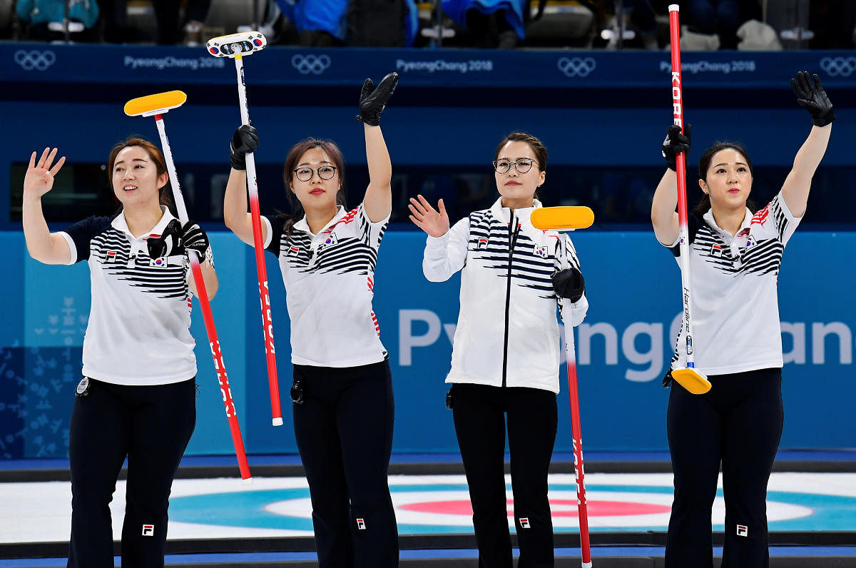 NEW SENSATION The South Korean curling team of (from left) Kim Eun-jung, Kim Kyeong-ae, Kim Seon-yeong and Kim Yeong-mi have become a rage at this Winter Olympics. REUTERS