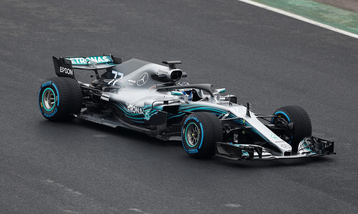 FIRST LOOK Valtteri Bottas test drives the new Mercedes car that was unveiled at Silverstone on Thursday. Reuters