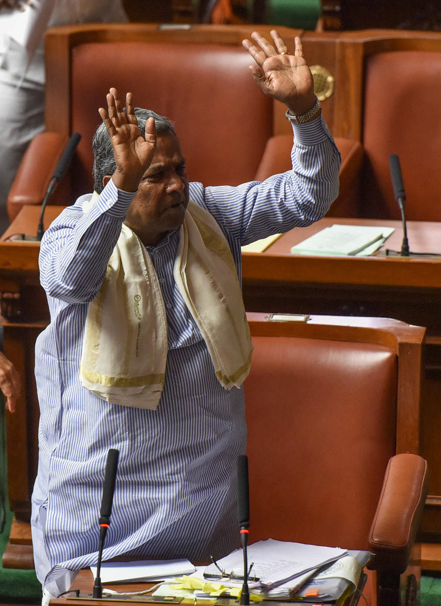 Chief Minister Siddaramaiah gestures during the reply to the motion of thanks to the governor in the Legislative Assembly on Thursday. DH Photos