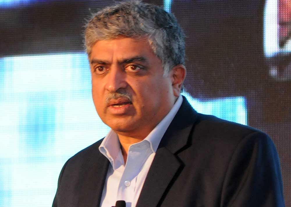 Former UIDAI chairman Nilekani - the brain behind the Aadhaar - is also a member of the GST return simplification committee. DH file Photo