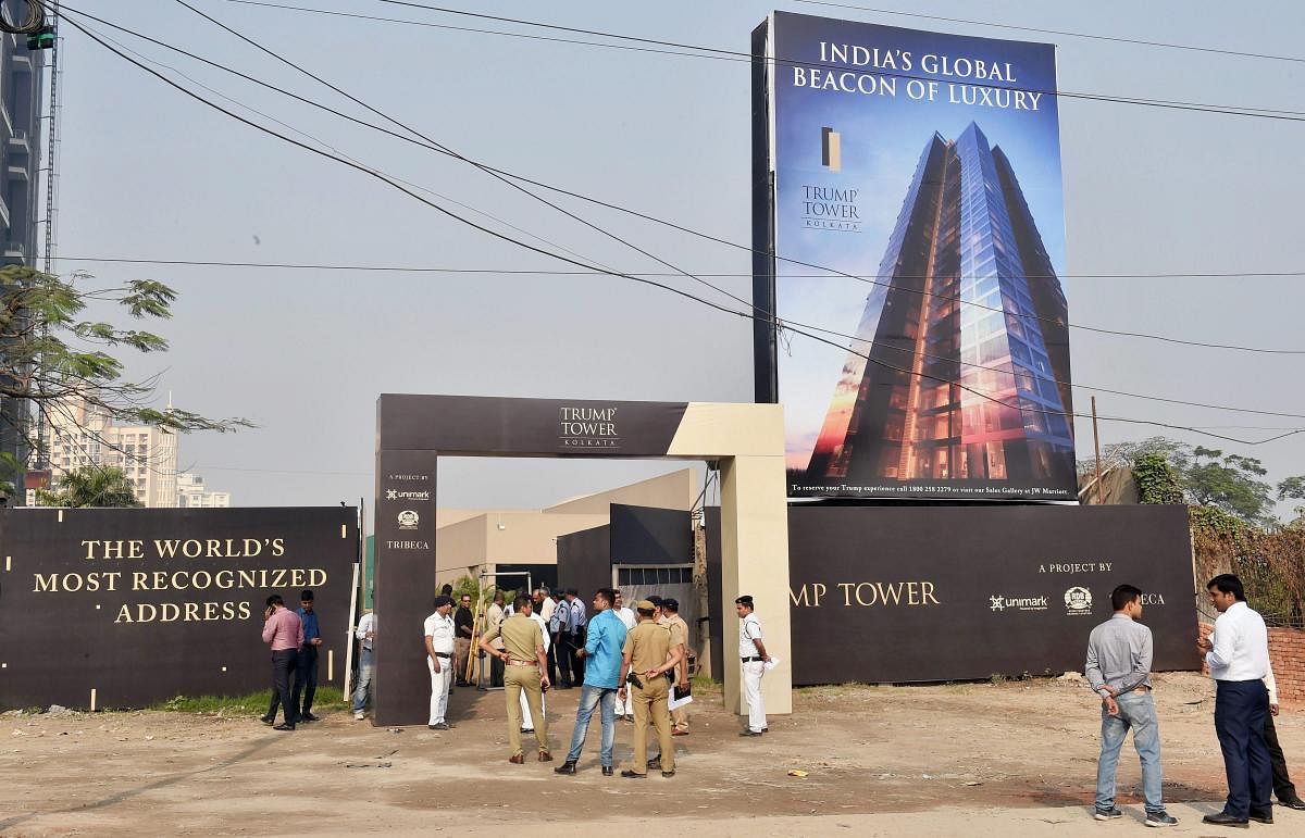 Kolkata: Security personnel stand guard infront of the site of Trump Tower, real estate project before the arrival of Donald Trump Jr. son of US President Donald Trump in Kolkata on Wednesday morning. PTI Photo by Swapan Mahapatra(PTI2_21_2018_000070B)