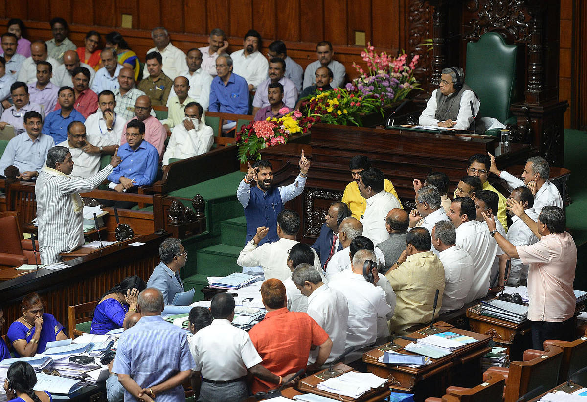 Chaos, uproar and sloganeering marked the last day of the 14th Karnataka Assembly on Friday, with the BJP and the Congress members accusing each other of being corrupt.  DH photo