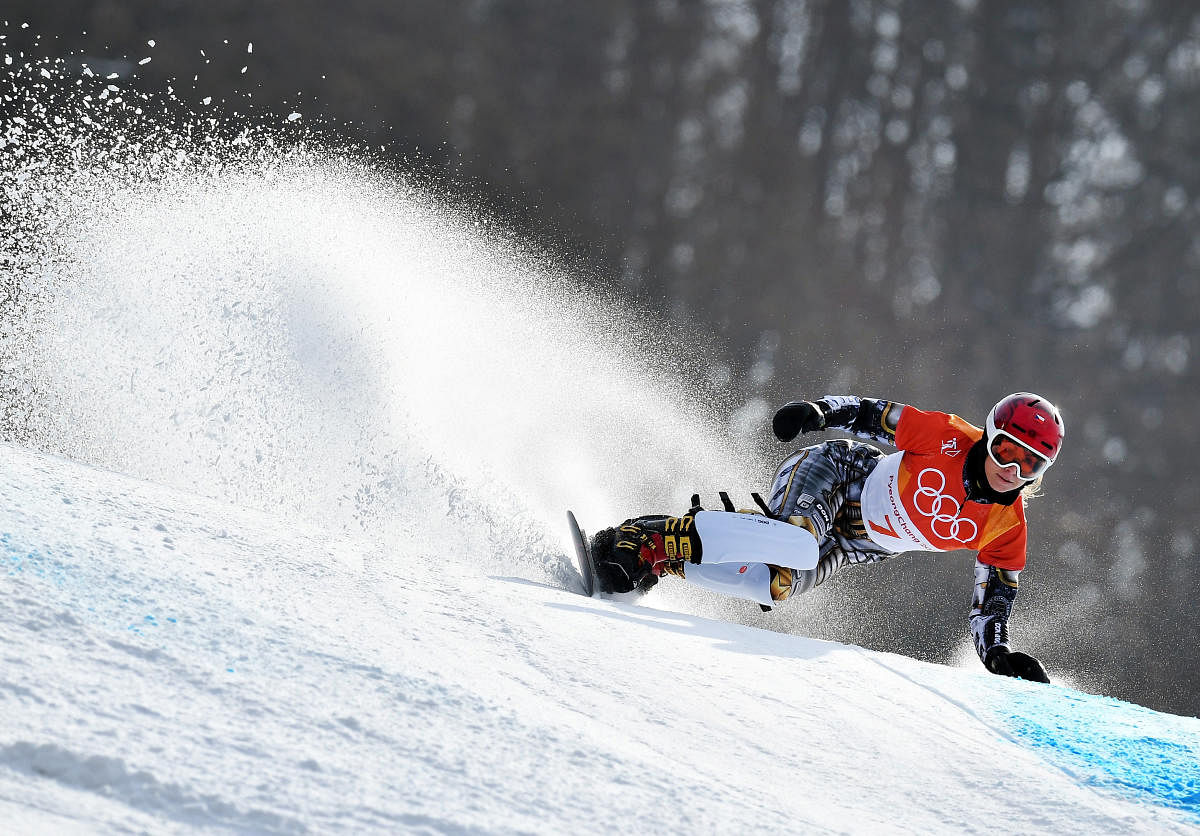 Ester Ledecka of Czech Republic competes in the snowboard women's parallel giant slalom final on Saturday. Reuters