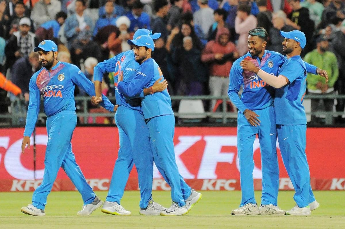 India's players celebrate after winning the third T20 cricket match against South Africa in Cape Town on Saturday. AFP