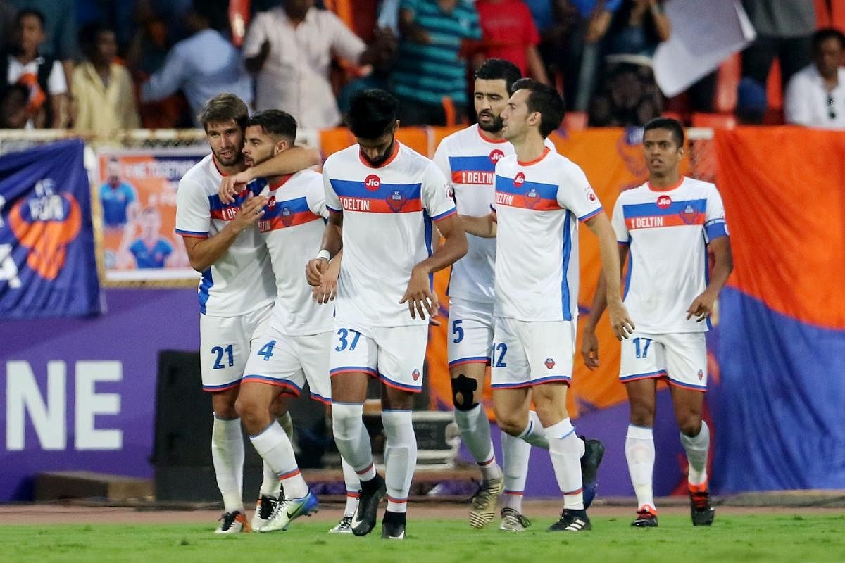 FINE EFFORT FC Goa's Hugo Boumous (second from left) celebrates after scoring against Pune City FC during their ISL game on Sunday. ISL MEDIA
