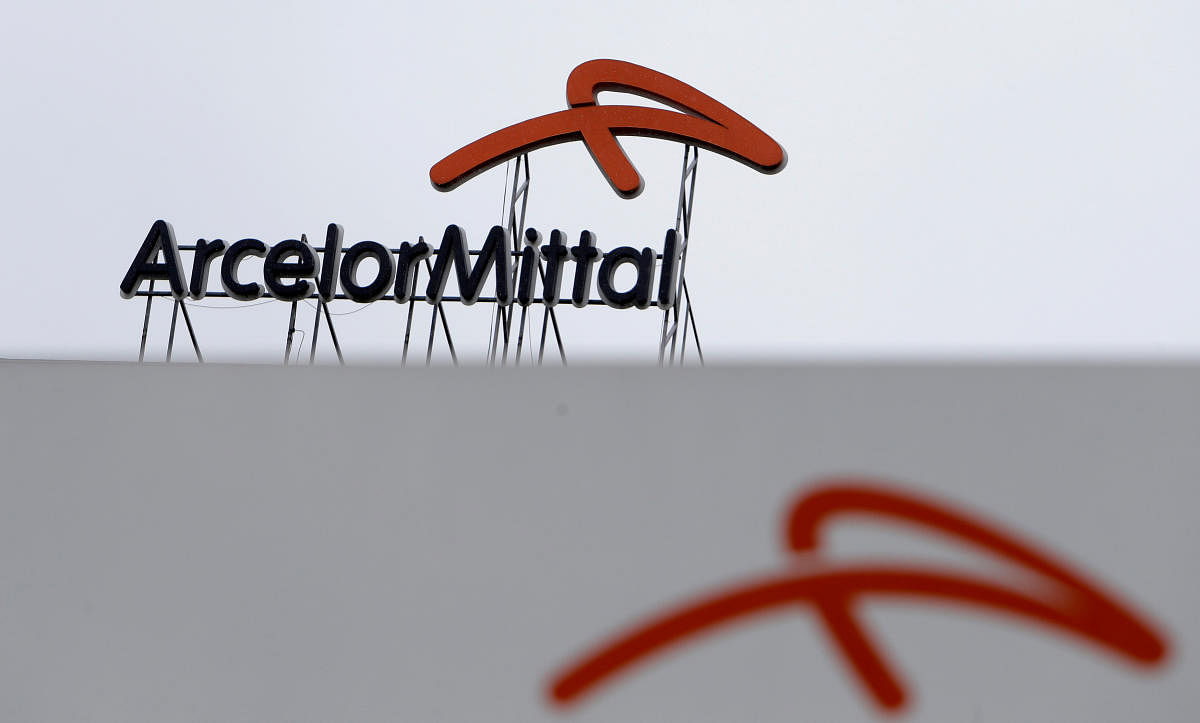 FILE PHOTO: A logo is seen on the roof of the ArcelorMittal steelworks headquarters in Ostrava, Czech Republic, April 1, 2016. REUTERS/David W Cerny/File Photo