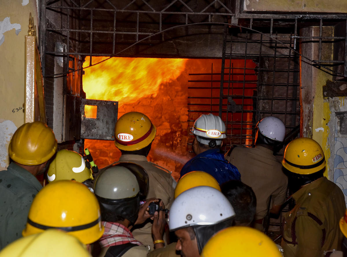 Fire personnel trying to douse the fire at the chemical factory on Monday. DH Photos/S K Dinesh