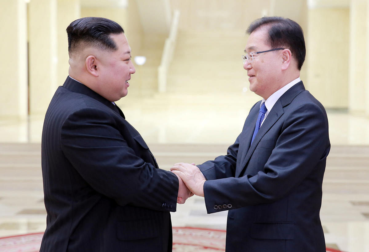 North Korean leader Kim Jong Un greets Chung Eui-yong, head of the presidential National Security Office, in Pyongyang, North Korea, on Tuesday. REUTERS