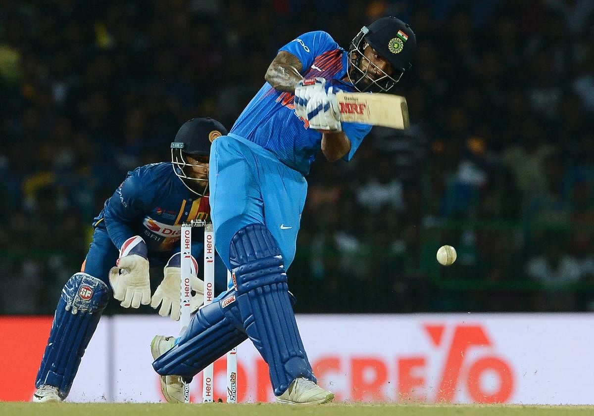 ON FIRE Indian opener Shikhar Dhawan en route his 90 against Sri Lanka in the the opening Twenty20 international of the tri-nation Twenty20 tournament in Colombo on Tuesday. AFP