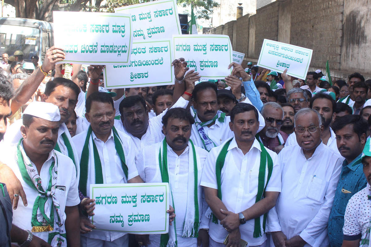 JD (s) leaders PGR Sindhya, T A Saravana and others in a Vikasaparva rally against miss roll of Congress Govt. in Bengaluru on Tuesday at Basavanagudi constituency in Bengaluru.