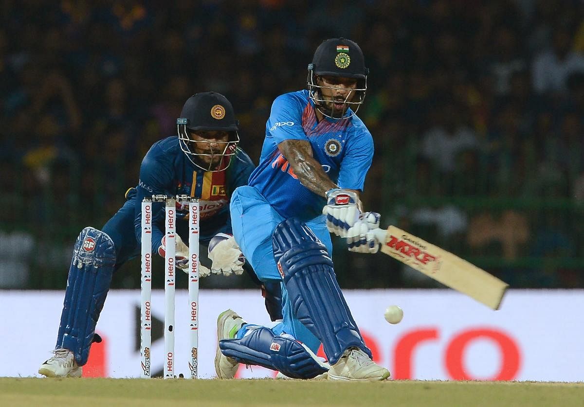 ON SONG: Shikhar Dhawan's brilliant 90 of 49 balls went in vain as Sri Lanka thumped India by five wickets in the opening match of the Nidahas Trophy. AFP