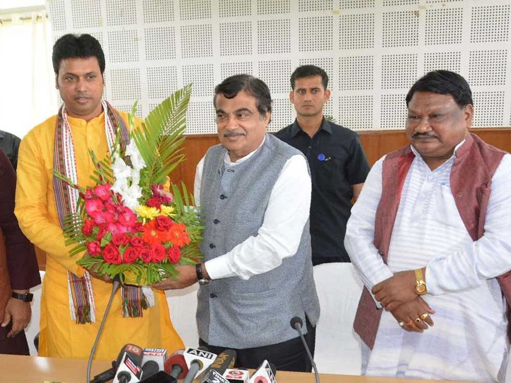 Union minister Nitin Gadkari congratulates Tripura Chief Minister-designate Biplab Deb, in Agartala on Tuesday.