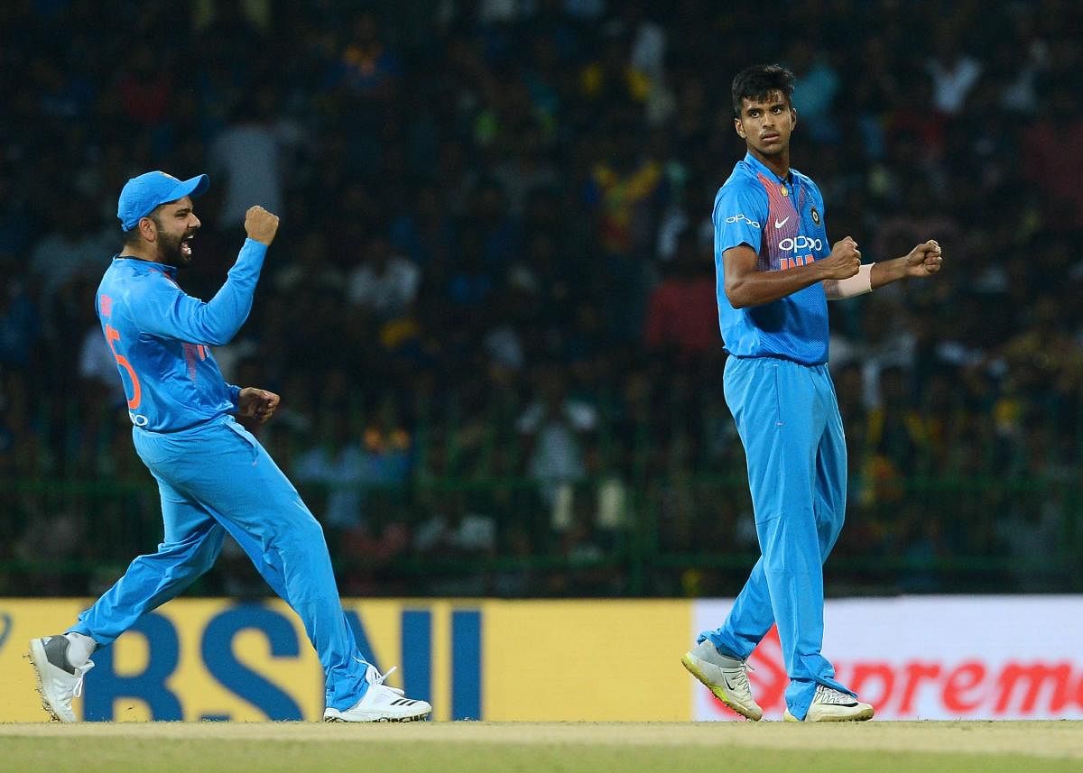 TALENTED Washington Sundar (right) was one of the few success stories for India in the first T20I against Sri Lanka. AFP