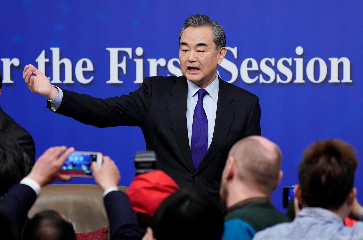 China's Foreign Minister Wang Yi speaks to the media during a news conference during the National People's Congress (NPC), China's parliamentary body, in Beijing, China March 8, 2018. REUTERS Photo